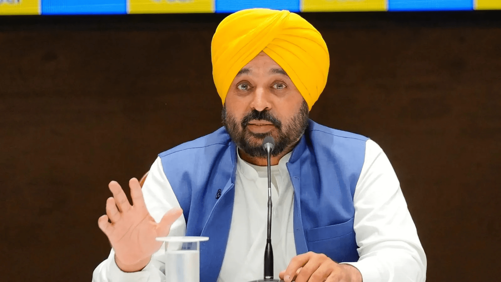 Punjab Chief Minister announcing ₹10 lakh universal health insurance scheme at public event